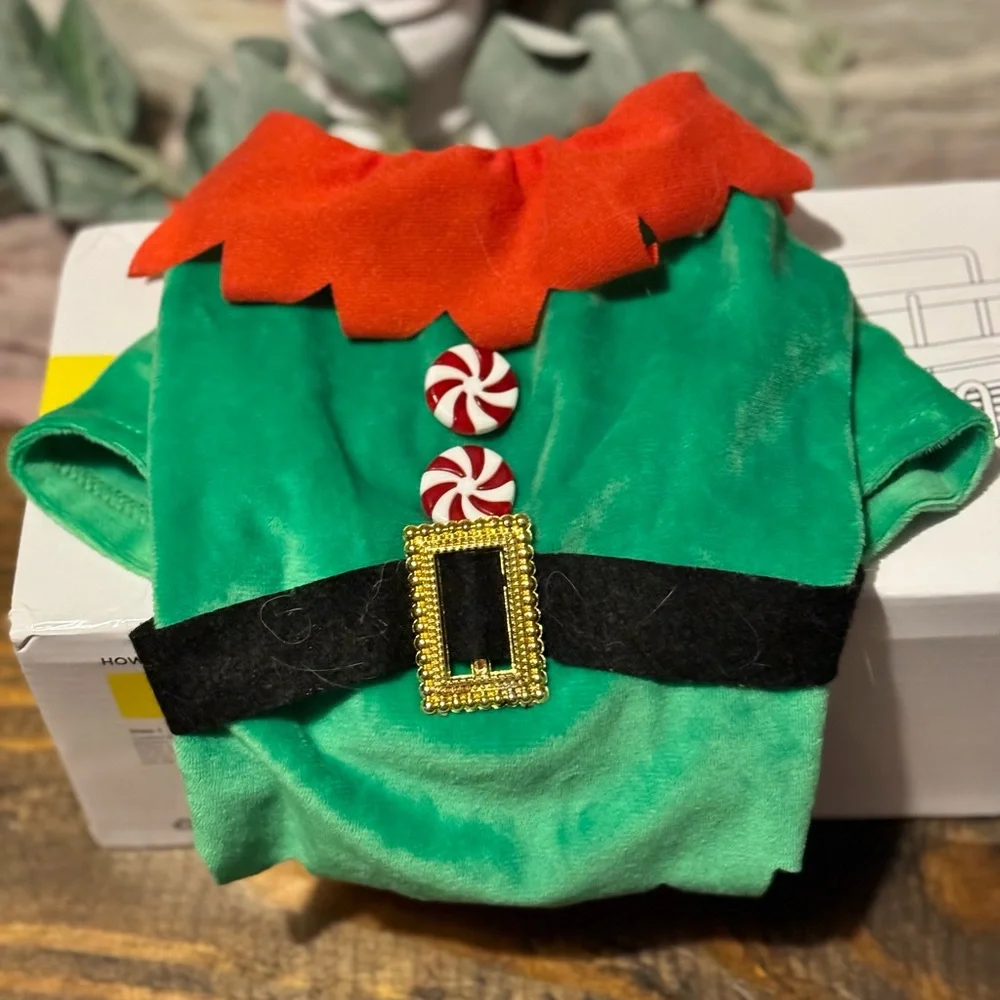 5 small dog pjs and shirts. $10 for all